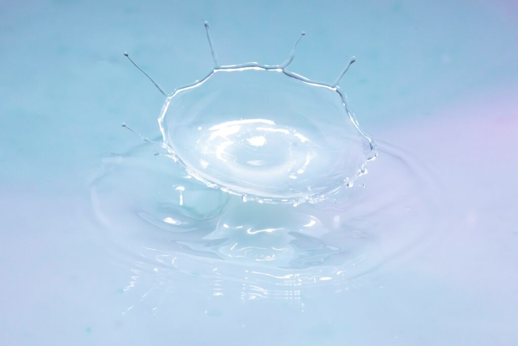 water drop in clear glass bowl